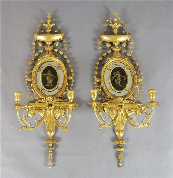 A pair of Hepplewhite style giltwood and gesso girandoles, W.1ft 1in. H.3ft 1in.